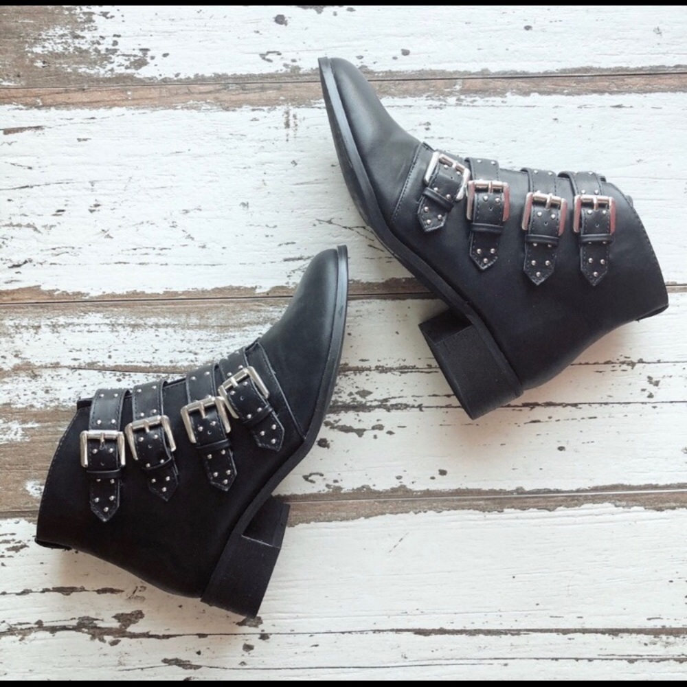 Buckled black boots